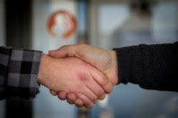 Acuerdo entre empresas de software